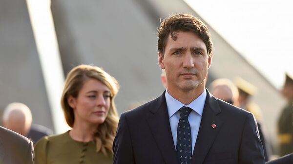 Премьер-министр Канады Джастин Трюдо посетил мемориальный комплекс Цицернакаберд (13 октября 2018). Еревaн - Sputnik Արմենիա