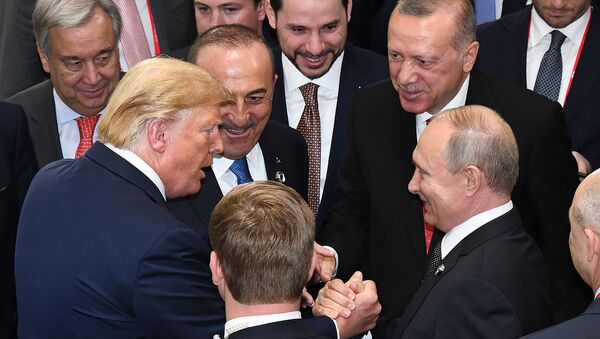 Президенты России, США и Турции, Владимир Путин, Дональд Трамп и Реджеп Тайип Эрдоган, и генсек ООН Антонио Гутерриш в кулуарах саммита G-20 (29 июня 2019). Осака - Sputnik Армения