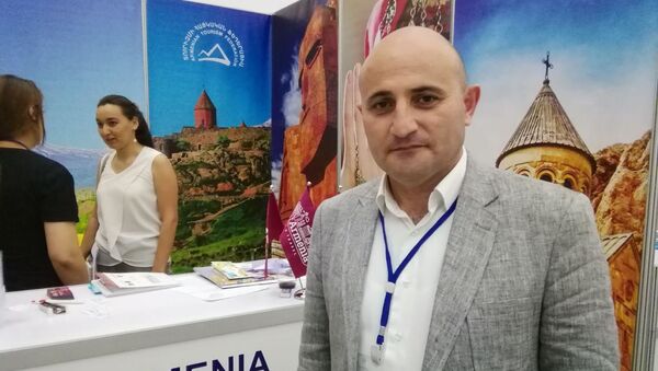 Мехак Апресян на туристической выставке в Узбекистане (9 июля 2019). Самарканд - Sputnik Армения