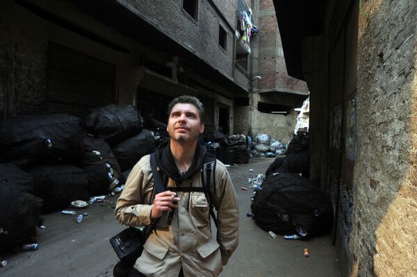 Фотокорреспондент Андрей Стенин на улице Каира - Sputnik Армения