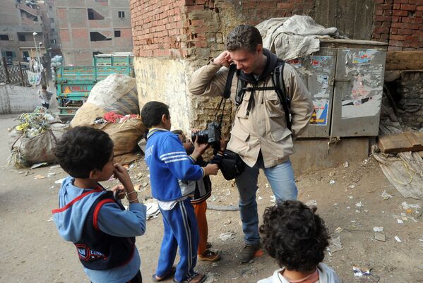 Ֆոտոլրագրող Անդրեյ Ստենինը Կահիրեի փողոցում - Sputnik Արմենիա