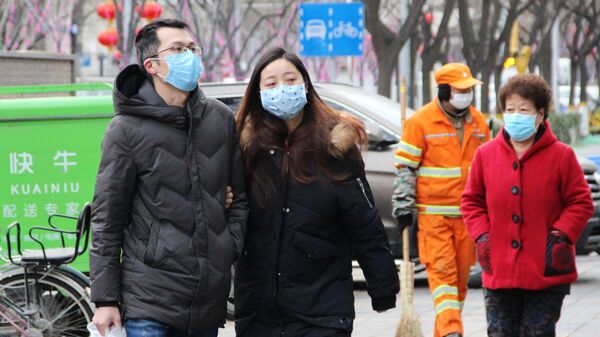 Жители Пекина в медицинских масках  - Sputnik Армения