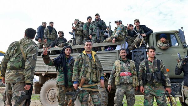 Солдаты сирийской армии наступают в городе Талл-Султан в направлении города Саракеб, расположенного на северо-западе сирийской провинции Идлиб (5 февраля 2020). Сирия - Sputnik Армения