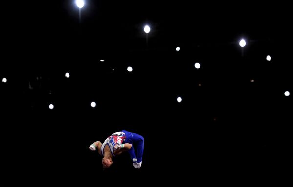 Артур Далалоян в командном многоборье среди мужчин на чемпионате мира по спортивной гимнастике в Штутгарте - Sputnik Армения