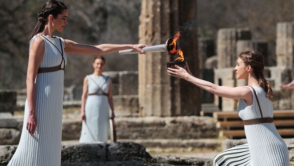 Церемония зажжения Олимпийского огня для Олимпийских игр в Токио 2020 (12 марта 2020). Олимпия, Греция - Sputnik Армения