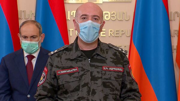 Стоп-кадр прямого эфира брифинга с участием премьер-министра Никола Пашиняна, начальника полиции Армана Саркисяна и министра здравоохранения Арсена Торосяна (28 мая 2020). Еревaн - Sputnik Армения