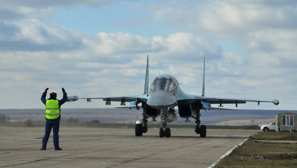 Первая группа бомбардировщиков Су-34 из Сирии приземлилась под Воронежем - Sputnik Армения