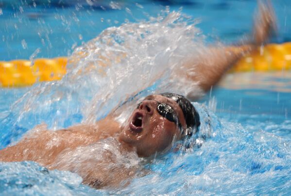 Американец Райан Лохте в финальном заплыве на 400 метров комплексным плаванием среди мужчин на XXX летних Олимпийских играх в Лондоне. - Sputnik Армения