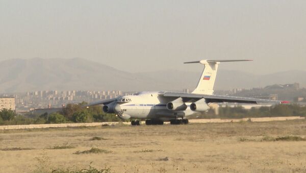 Самолет с гуманитарным грузом вылетел в Сирию - Sputnik Армения