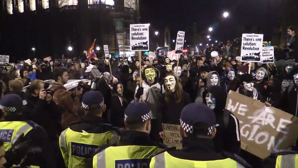 СПУТНИК_Сторонники хакерского движения Anonymous прошли маршем по центру Лондона - Sputnik Արմենիա