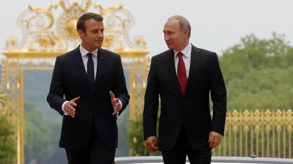 Президенты России и Франции Владимир Путин и Эммануэль Макрон во время встречи в Версальском дворце (29 мая 2017). Париж - Sputnik Армения