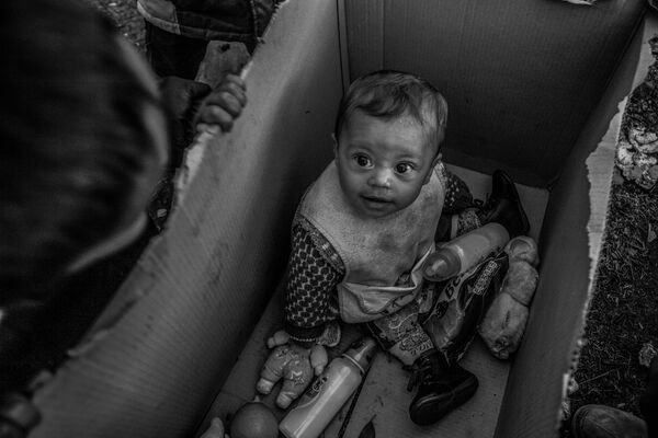 3 место в номинации «Главные новости. Одиночная фотография». Специальный приз Международного Комитета Красного Креста (МККК) «За гуманитарную фотографию» - Sputnik Армения