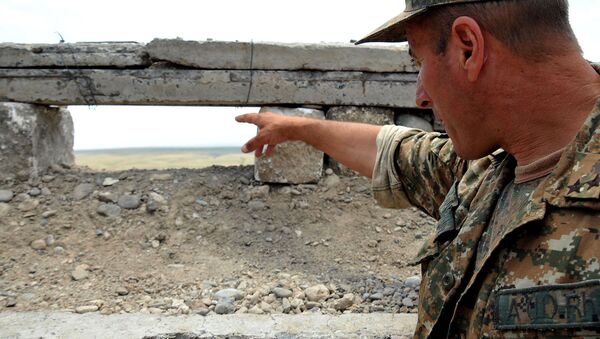 Армянский военнослужащий на боевой позиции - Sputnik Արմենիա